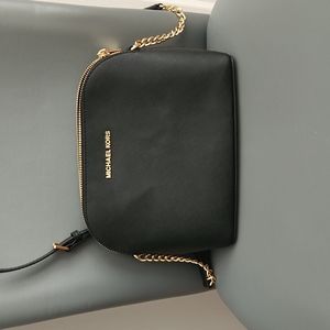 Michael Kors black leather crossbody bag